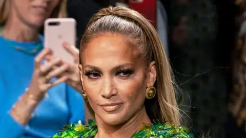 Versace Sued This Fast Fashion Brand for Ripping Off J-Lo’s Iconic Jungle Dress